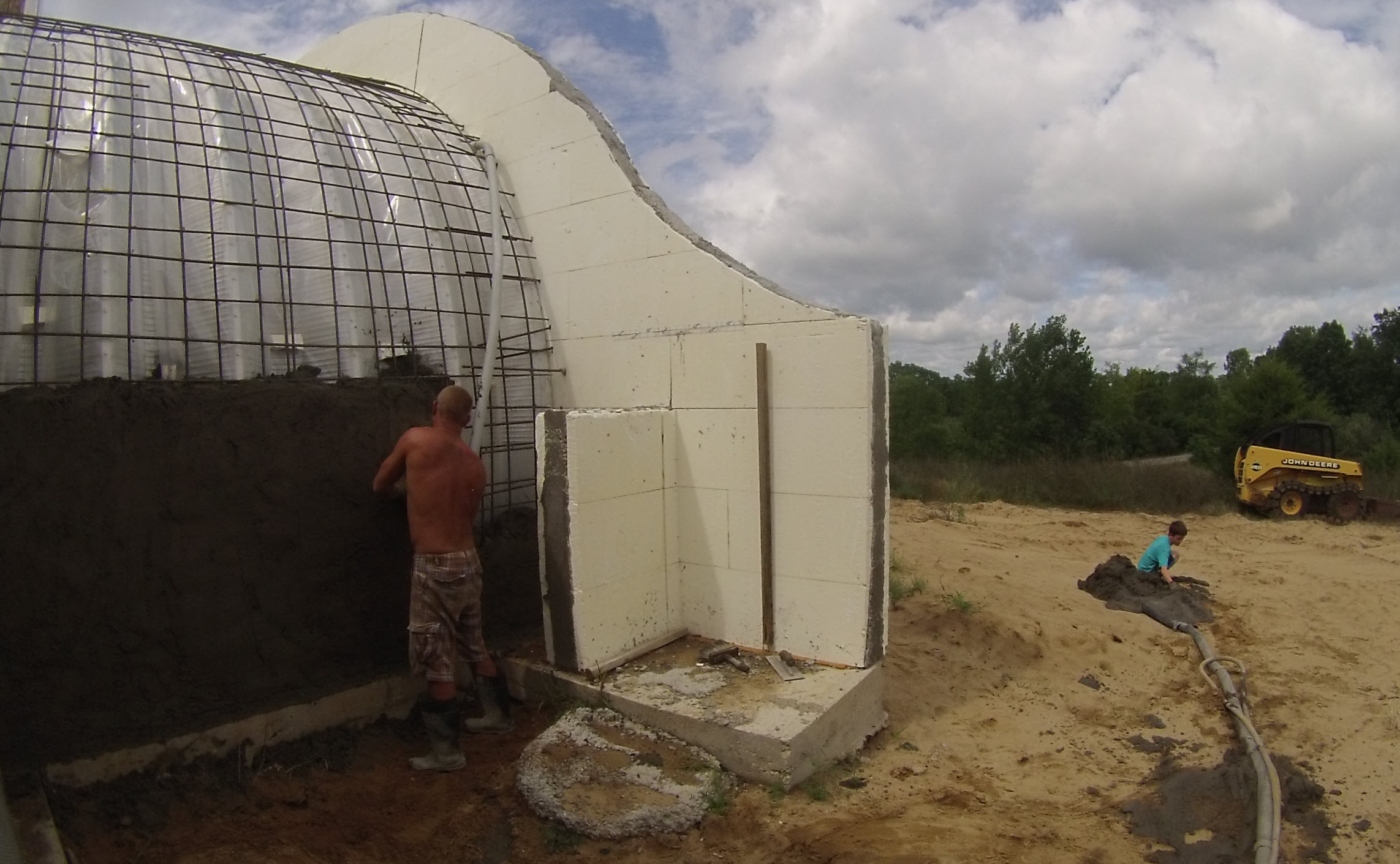 Rebar and Shotcrete over the Quonset Hut - Home in the Earth